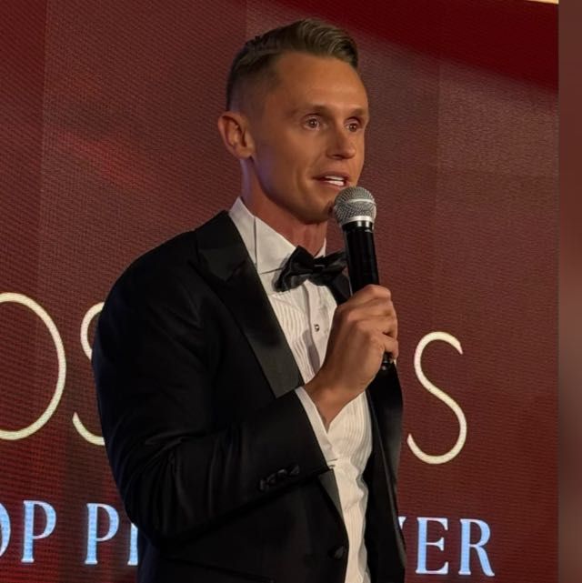 Matthew Kimber speaking at an industry awards ceremony